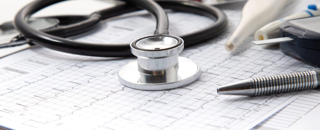 Healthcare insurance and medical background concept. Black stethoscope medical equipments and medical technology concept.